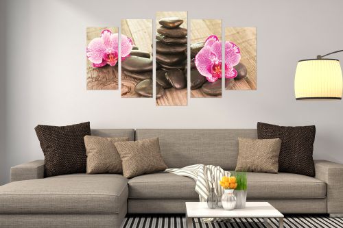 Zen canvas art composition with orchids and stones wooden background